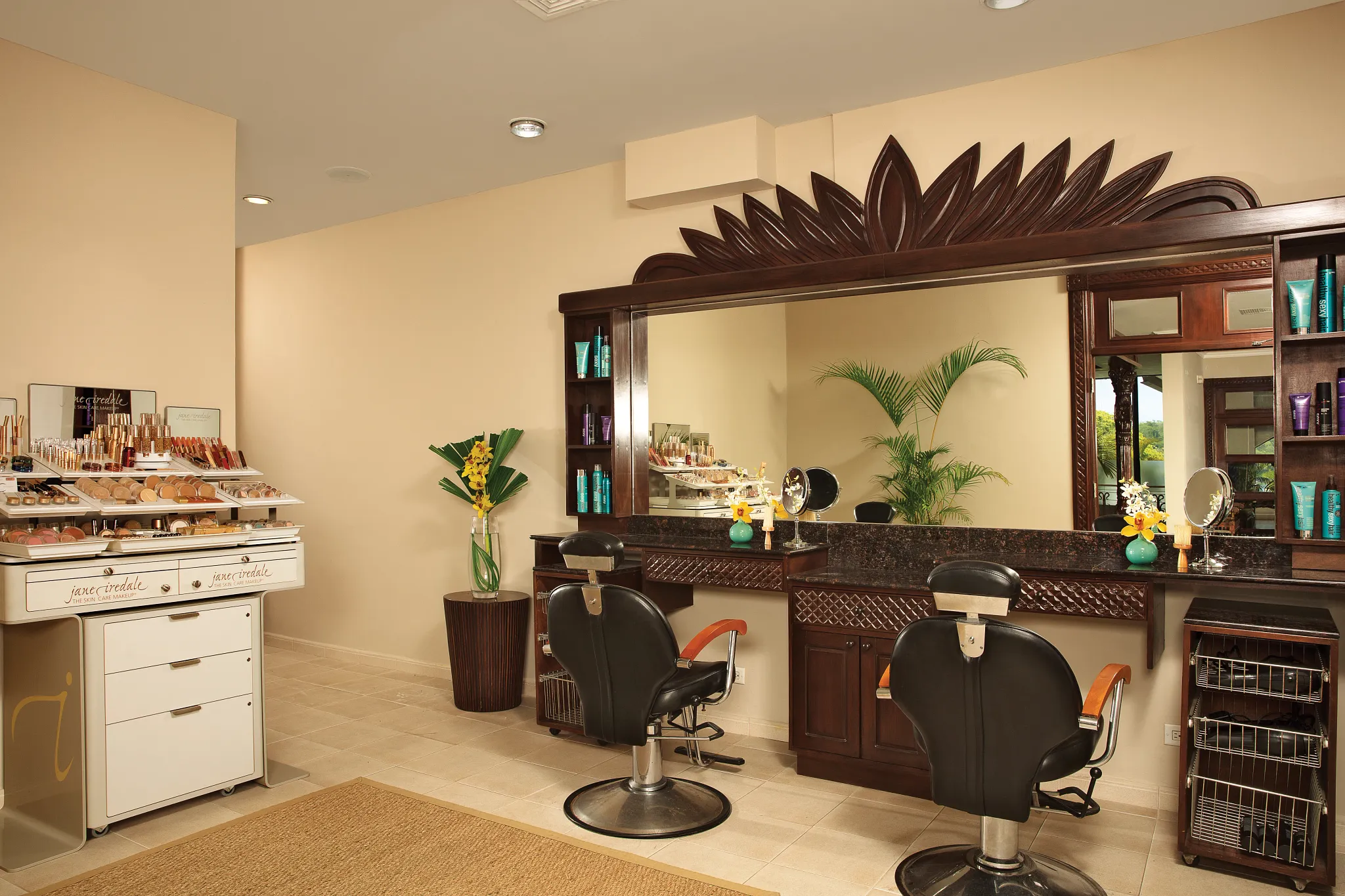 Beauty salon with styling chairs and makeup stations at Dreams Playa Bonita Panama, offering professional spa and salon services.