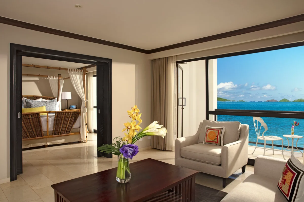 Preferred Club One-Bedroom Presidential Suite Ocean View bedroom with king bed at Dreams Playa Bonita Panama.